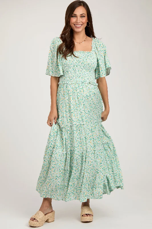 Curated collections of sophisticated women’s wear   Green Floral Smocked Tiered Maternity Maxi Dress