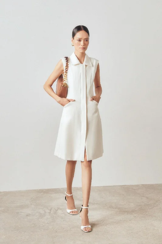 Discover the latest trends in women’s fashion   Jani Straight Sleeveless Linen Knee-length Dress