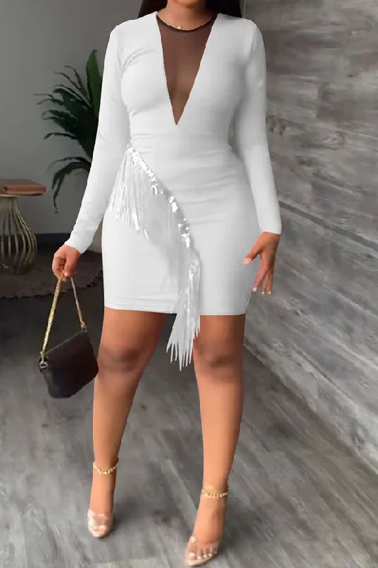 Stylish clothing designed to flatter every woman   Solid Color Pretty Tassel Mini Dress