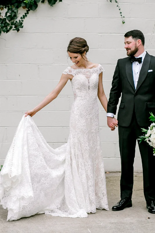 Modern fashion pieces designed for all women   Elegant Sheer Back Cap Sleeves Ivory Wedding Dress