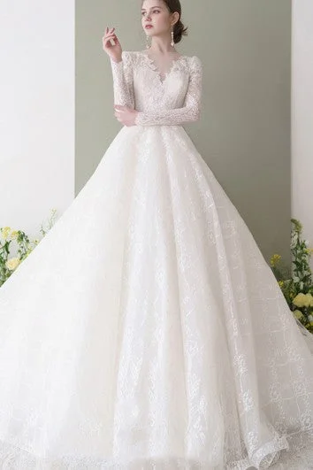 Iconic women’s outfits that never go out of style   Romantic Ball Gown Lace Floor-length Long Sleeve Keyhole Wedding Dress with Appliques