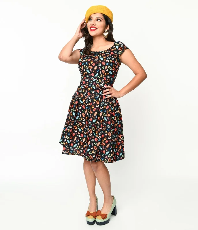 Perfect fashion pieces for the busy woman   Retrolicious Black Leaves & Acorns Margaret Flare Dress