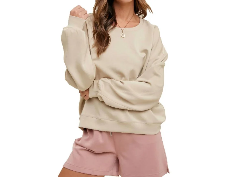Refresh your wardrobe with trendy women’s apparel   Relaxed Sweatshirt In Macadamia