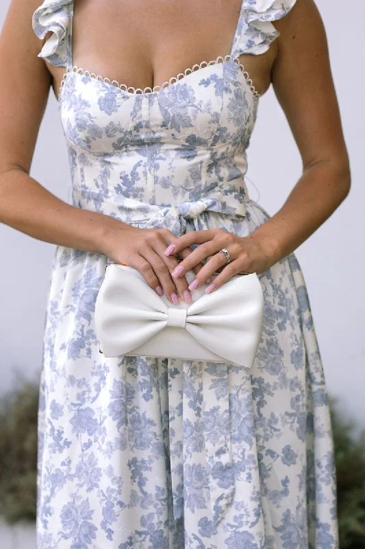 Feminine silhouettes for the modern woman   Belle Evening Clutch