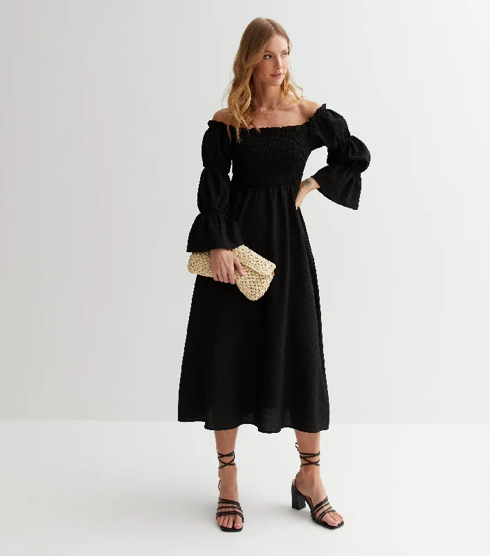Timeless clothing pieces every woman should own Black Textured Shirred Top Smock Midi Dress Timeless clothing pieces every woman should own Black Textured Shirred Top Smock Midi Dress