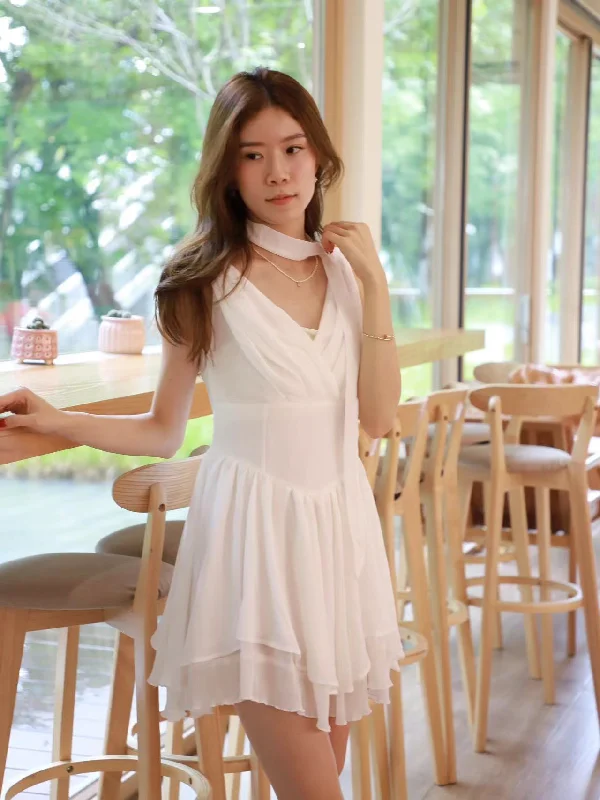 Sleek and sophisticated fashion for modern women Chiffon Bonnie Mini Dress with strap Sleek and sophisticated fashion for modern women Chiffon Bonnie Mini Dress with strap
