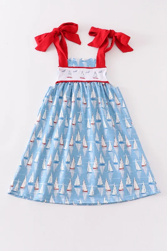 Refresh your wardrobe with trendy women’s apparel   Blue sailboat embroidery dress