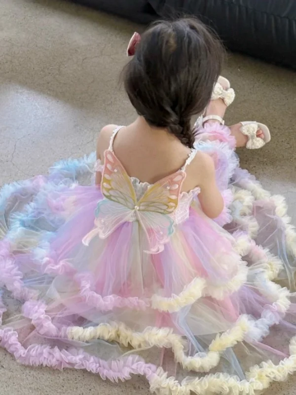 Effortlessly chic fashion for today’s woman Taking Flight Butterfly Tiered Smocked Dress Effortlessly chic fashion for today’s woman Taking Flight Butterfly Tiered Smocked Dress
