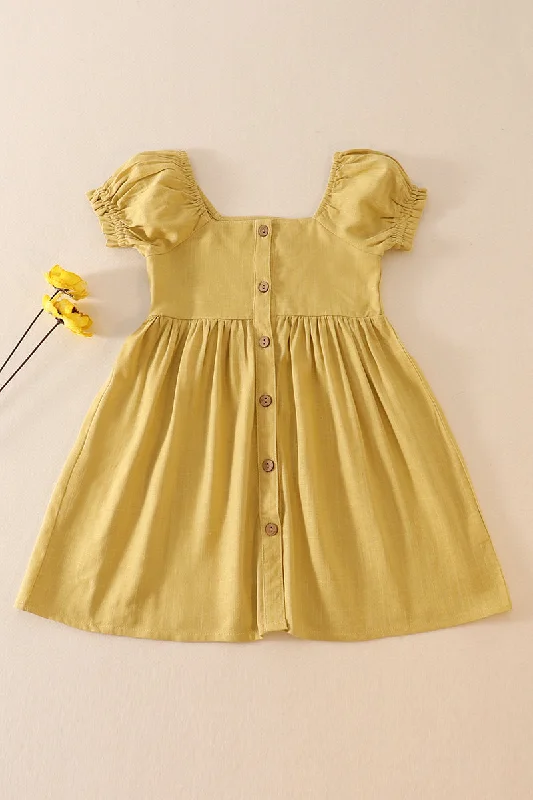 Effortlessly chic fashion for today’s woman   Lemon linen button dress