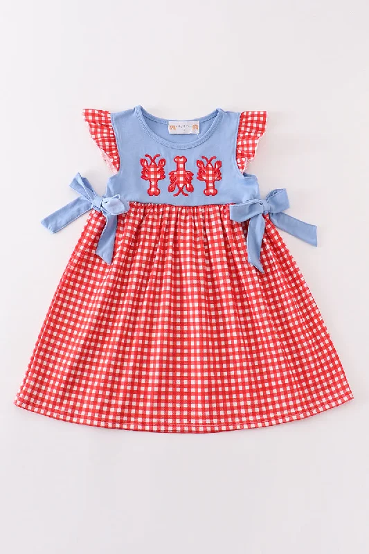 Feminine silhouettes for the modern woman   Red plaid lobster applique dress