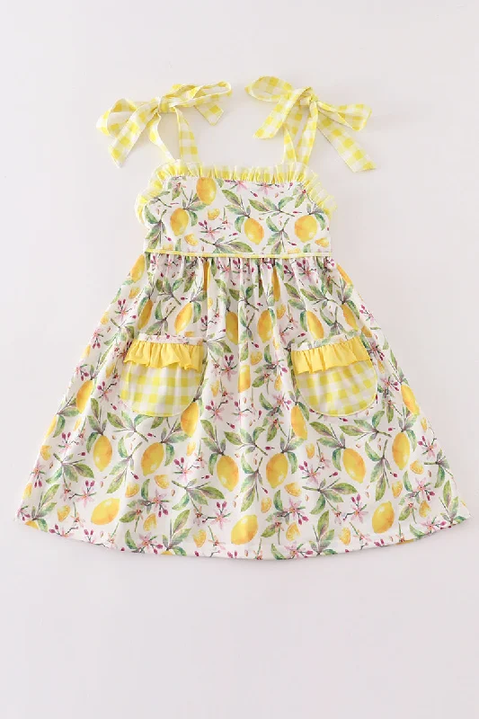 Bold and sophisticated looks for every woman   Yellow lemon ruffle dress