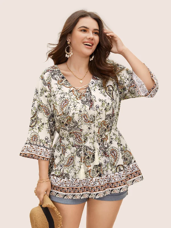 High-quality women’s wear for everyday elegance   Boho Print Tie Knot Tassels Crisscross Blouse