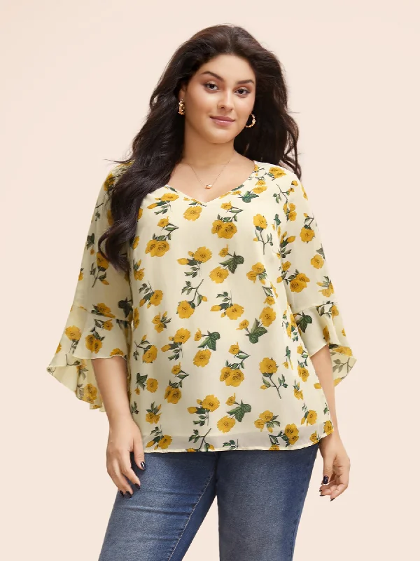 The ultimate guide to stylish women’s fashion   Floral Ruffle Sleeve Split Hem Blouse