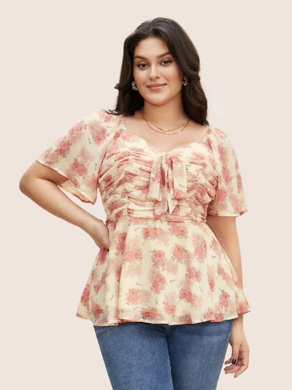 Sporty-chic women’s apparel for active lifestyles Heart Neckline Floral Tie Knot Ruched Blouse Sporty-chic women’s apparel for active lifestyles Heart Neckline Floral Tie Knot Ruched Blouse