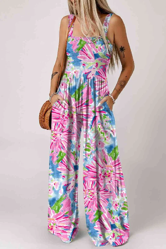 Elevate your look with premium women’s wear Floral Smocked Square Neck Jumpsuit with Pockets Elevate your look with premium women’s wear Floral Smocked Square Neck Jumpsuit with Pockets